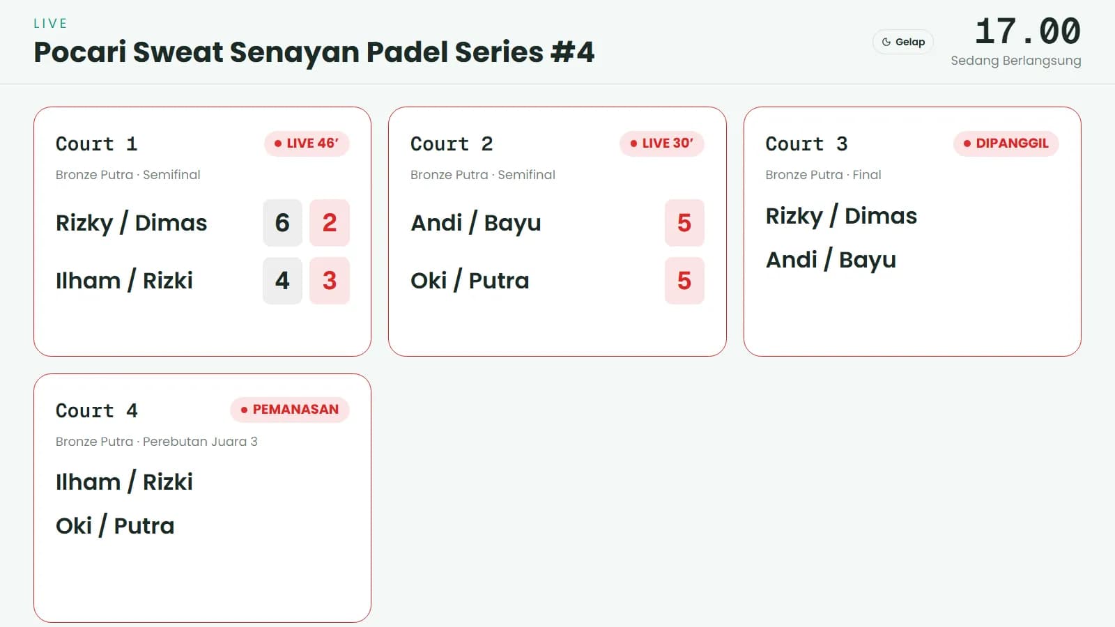 Layar venue: skor live per court dengan tipografi besar untuk TV